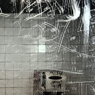 Anti-graffiti protective peel-away film applied to retail convenience store surface to stop vandalism and scratches