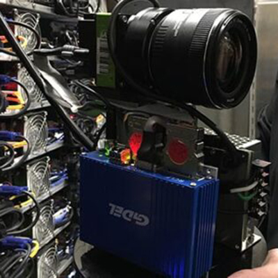 Major League Baseball home plate broadcast camera protected by a TearOff 4-layer sacrificial film stack