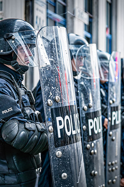 tactical-swat-vehicle-glass-shield-protective-film TearOff multi-layer protective film installed on tactical SWAT vehicle armored viewing window and helmet visor
